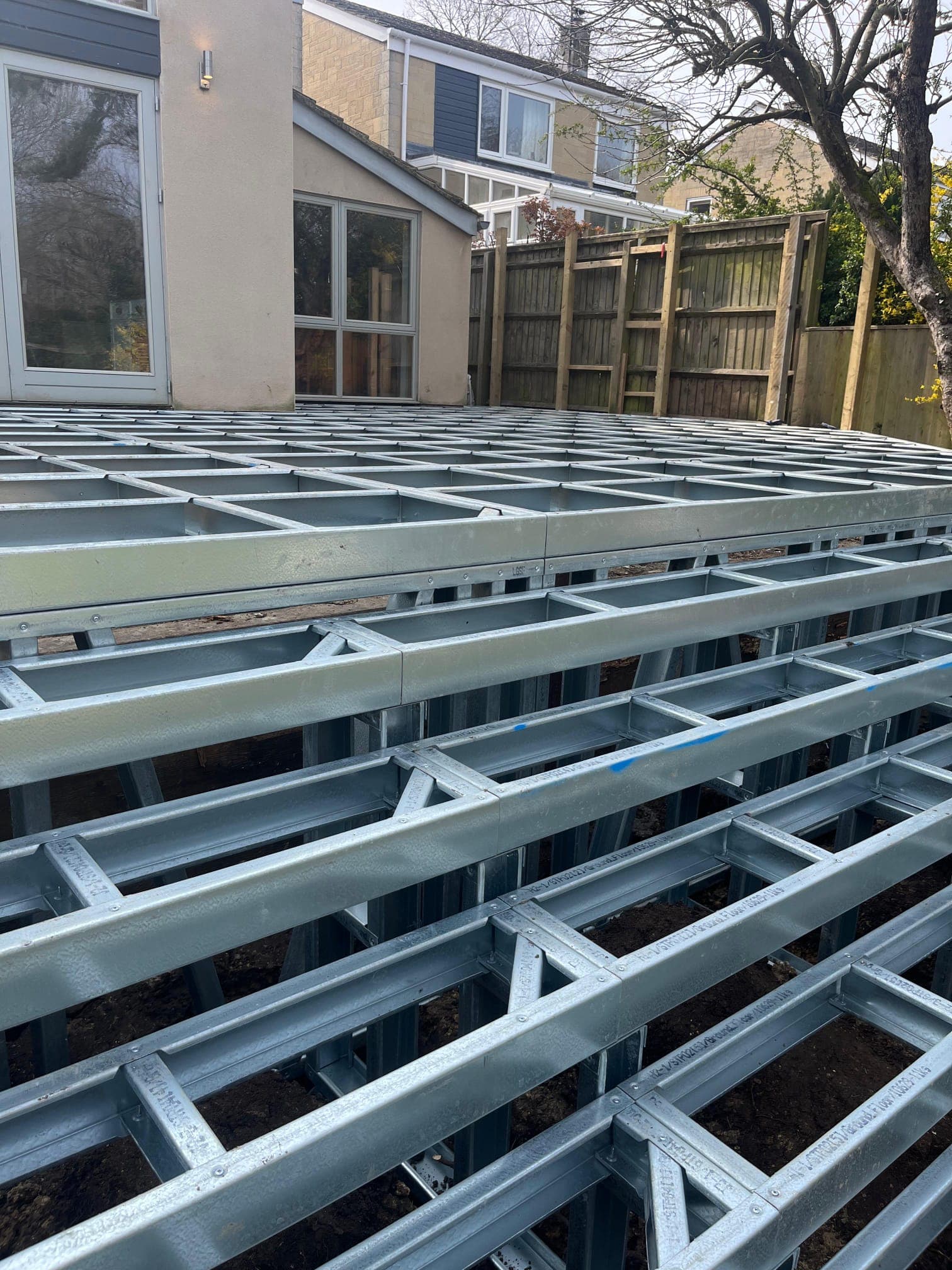 Close-up detail of the iFrame galvanised steel grid: CNC cut to millimetre precision