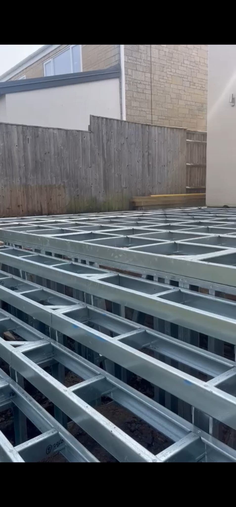 Multi-level iFrame steel installation showing terraced steps built from the frame